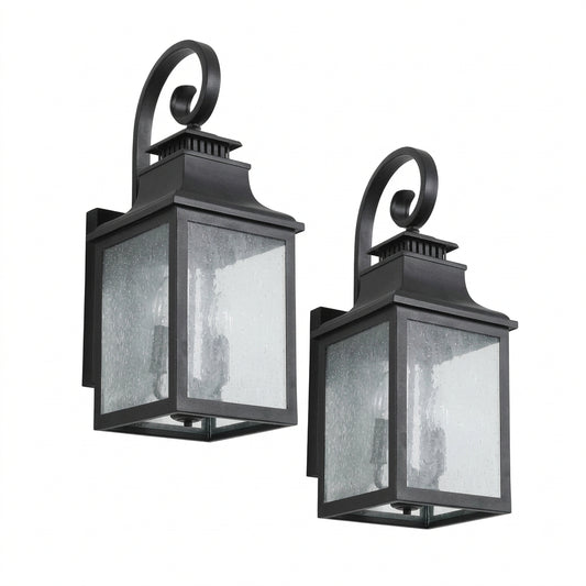Set of two traditional black outdoor wall sconces with decorative glass shades for porch, entryway, patio, or garage lighting.