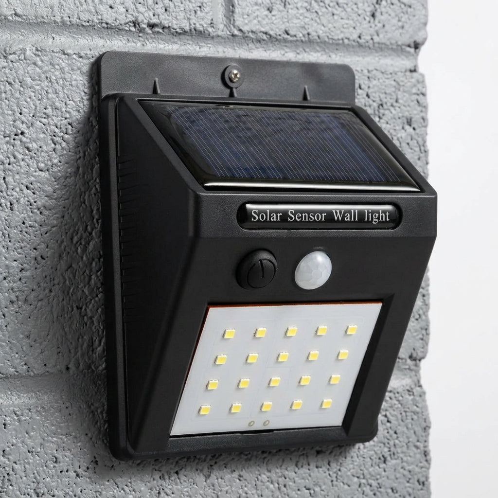Compact black solar LED light with motion activation for garden paths, patios, and other outdoor areas.