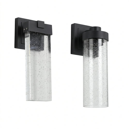 Set of two black outdoor wall lights with slim vertical designs and clear decorative crystal-bubble shades.