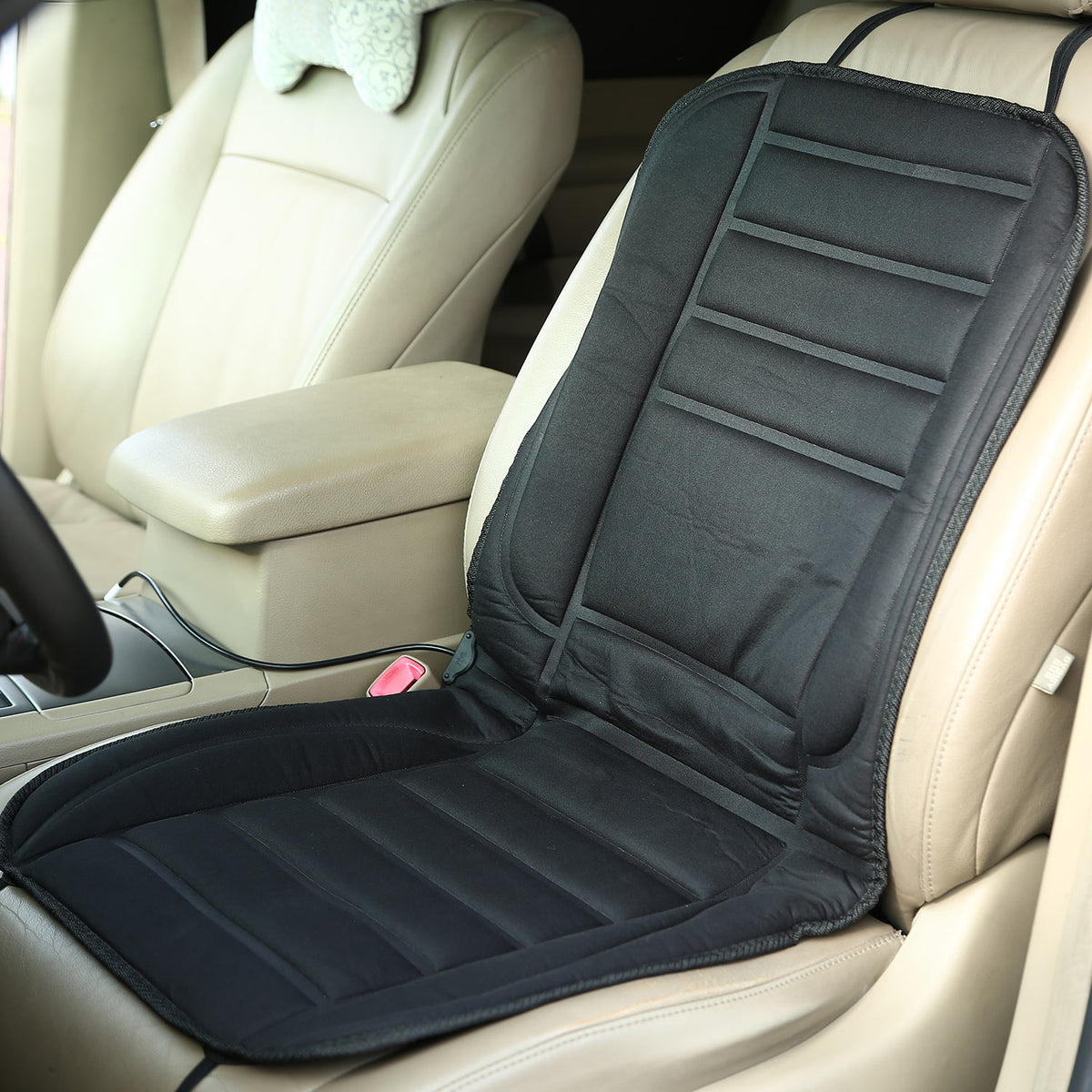 Portable black heated seat cushion for compatible cars, trucks, SUVs, vans, and RVs with a 12V power outlet.